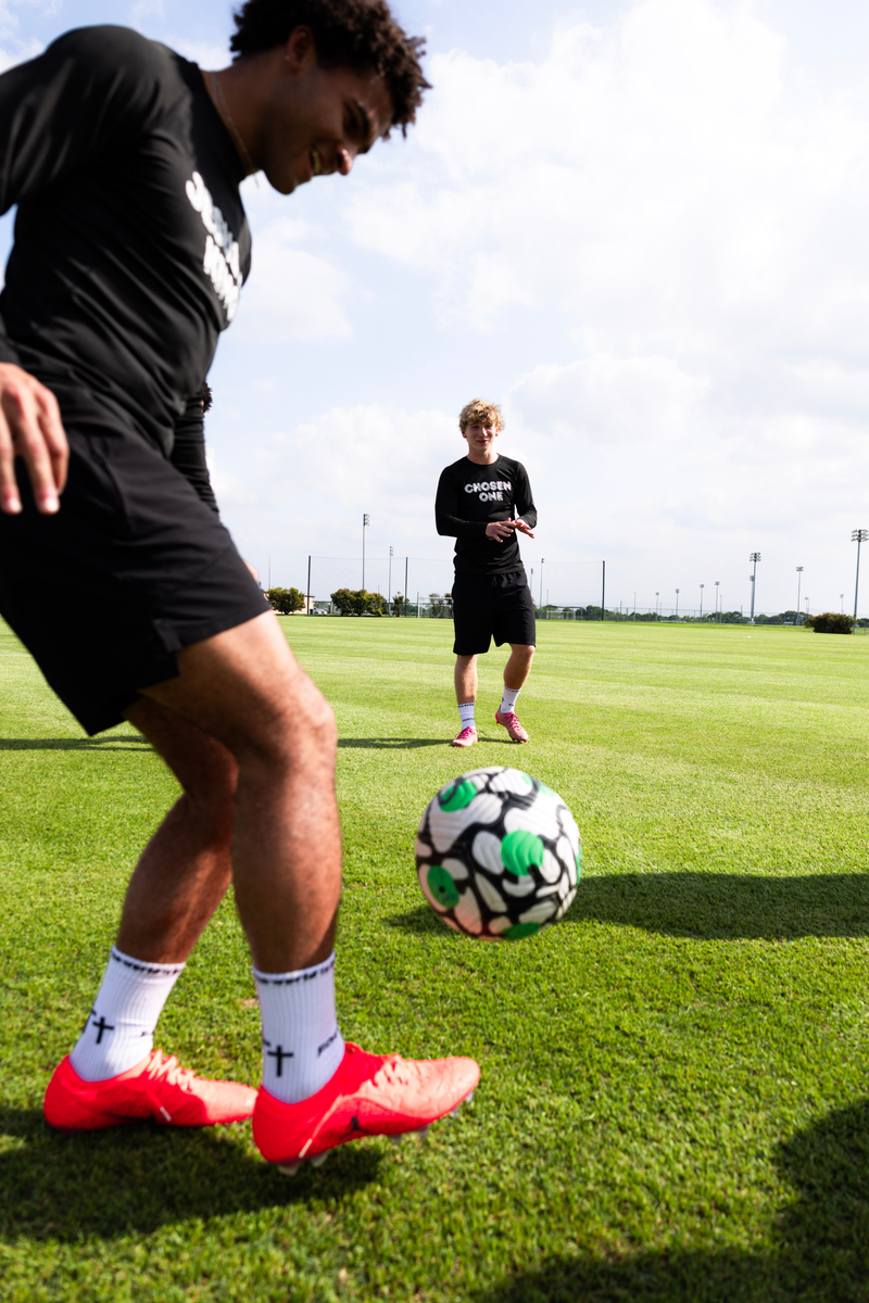 Footballers wearing FAITHNFOOTY